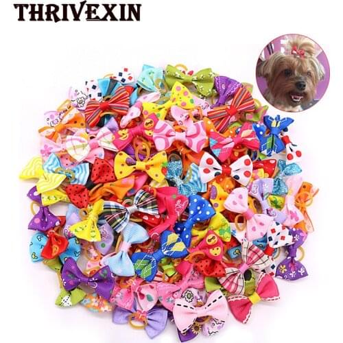 20pcs Dogs Bows Hair Dog head flower bowknot rubber band Pets Cat Hair Accessories Grooming Bows Pet Supplies