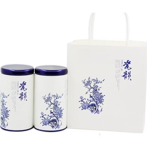 Xin Jia Yi Packaging Blue and White Element Appearance High Quality Double Tin Plate For Round Packaging With Free Handle Bag