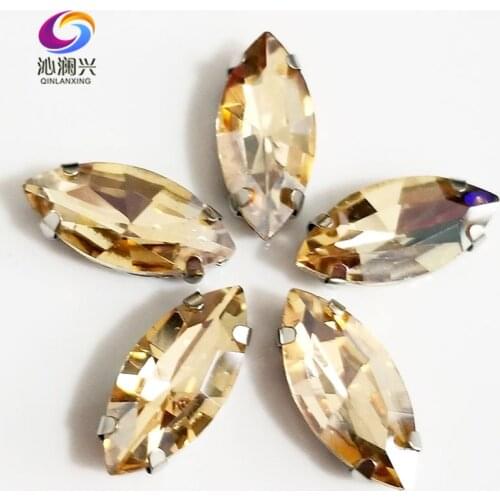 Free shipping Golden champion Horse eye shape High quality Glass Crystal sew on claw rhinestones,Diy Clothing accessories SWM05