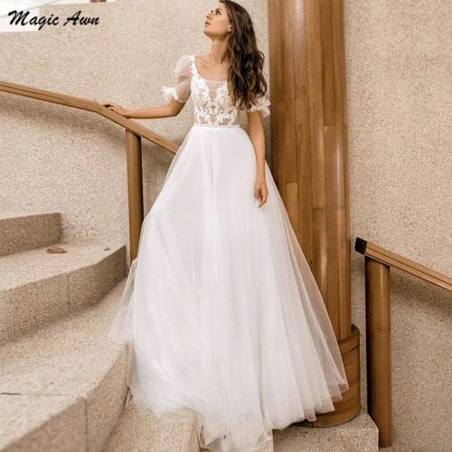 Magic Awn Princess Bohemian Wedding Dresses 2021 Short Puff Sleeve Lace Appliques Illusion Beach Bridal Gowns A-Line Robe Mariee