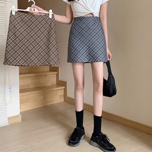 Early spring 2021 new Korean version of the plaid high waist bag hip skirt casual thin A-line short skirt