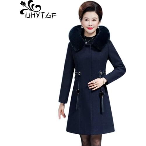 UHYTGF Women Winter Woolen Coat Fashion Fur Collar Hooded Casual Warm Outerwear Female Korean Loose 5XL Plus Size Jacket 723