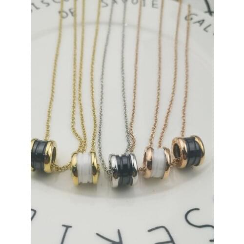 Roxy Classic Design Beautiful Spiral Ceramic Pendant Necklace Women Titanium Steel Top Quality Roman Numeral Necklace Jewelry