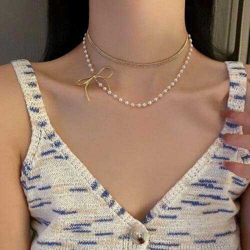 South Korea East Gate fashion new pearl bowknot double necklace clavicle chain neck chain girly temperament necklace