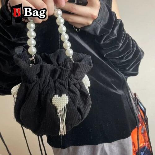 Girl shoulder bag Love pearl bow mini pocket bag womens new fashion niche design handbag female underarm Bag Satchel