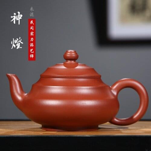 Yixing original mine red robe purple sand teapot god lamp pure manual Festival high rise teapot authentic custom hair