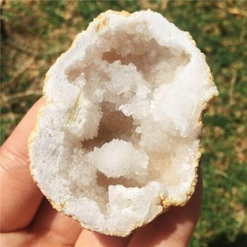 Natural agate geode crystal hole Mineral specimen contains clean crystal clusters of very beautiful small stones and crystals