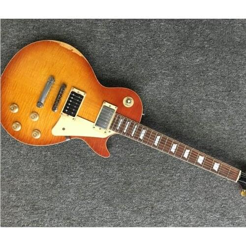 Own designed shape.electric guitar relic finished maple board top one piece mahogany body and neck.free ship