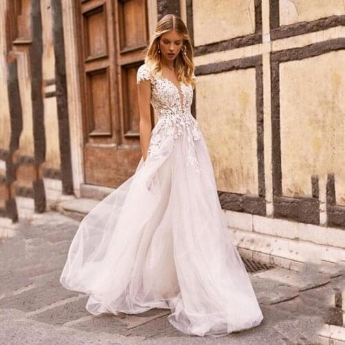 Modest Scoop Neck Wedding Dresses Sexy Backless Appliques lace Bohemian Bridal Dress 2021 New Country Wedding Dress Custom Made