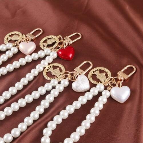 New Creative Pearl Bracelet Cute Peach Heart Alloy Key Ring Bag Pendant Accessories Car Keychain Key Ring Womens Decorative Bag