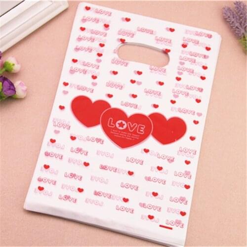 2017 New Style Wholesale 100pcs/lot 20*30cm Plastic Wedding Gift Packing Bags With Red Heart Favor Christmas Supply Packaging