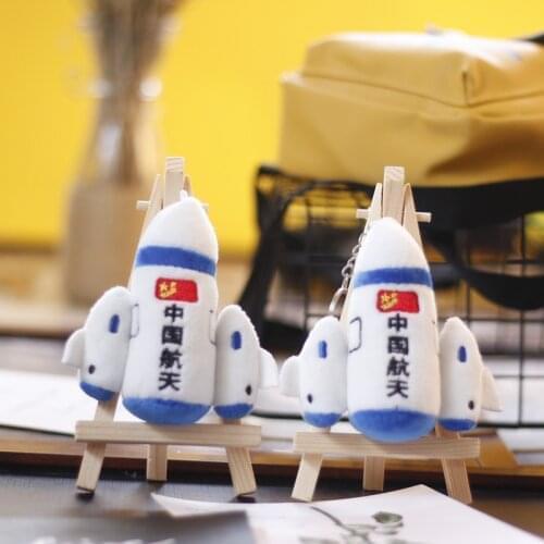 Exquisite popular Cute creative cartoon rocket pendant plush spaceship doll childrens school bag keychain small Collection gift