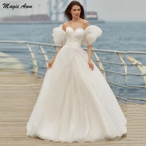 Magic Awn Sparkly Beach Wedding Dresses Detachable Puffy Sleeves Sequins Beaded Sweetheart Bohemian Princess Bridal Gowns 2021