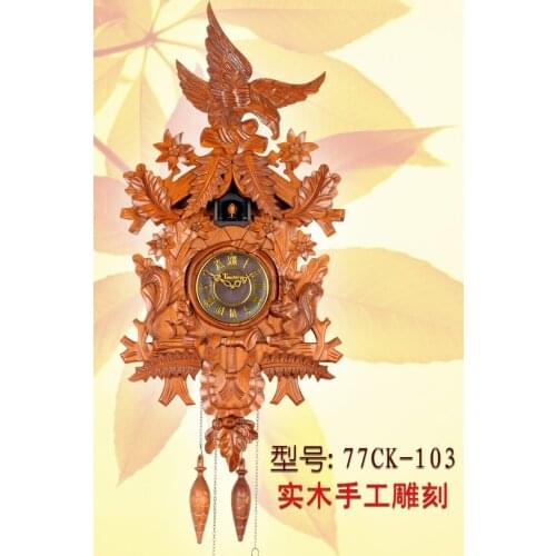 Cuckoo clock cuckoo clock clock pendulum control manual solid wood engraving European clock retro living room watch
