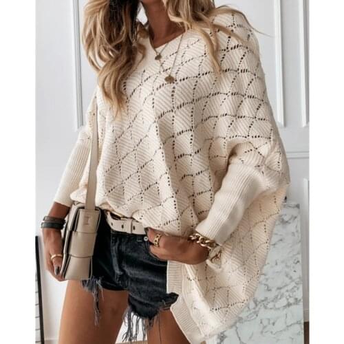 Autumn and winter new set head V-neck solid color hollow bunch bat sleeve loose long knit sweater girl