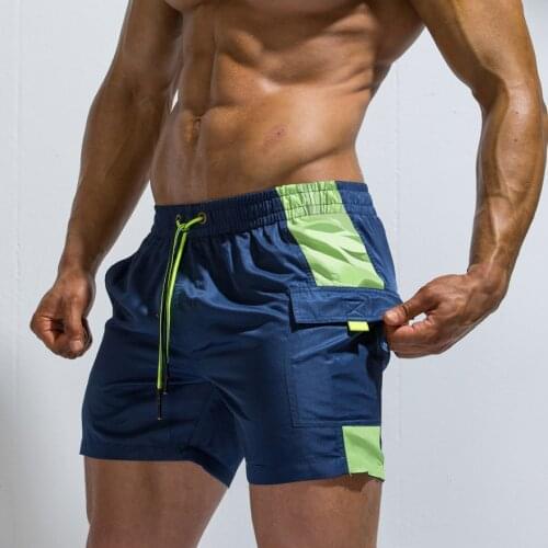 2021 Beach Shorts Men Sportswear Man Loose Swim Suits Mens Seaside Quick Drying Plus Size Bathing Suit Pocket Sports Shorts