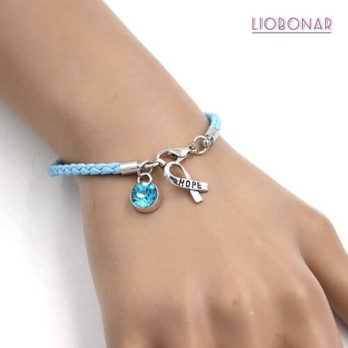 10PCS Wholesale Light Blue Awareness Bracelet Jewelry PU Leather Hope Ribbon Charm Bracelets for Cancer Center Foundation Gift