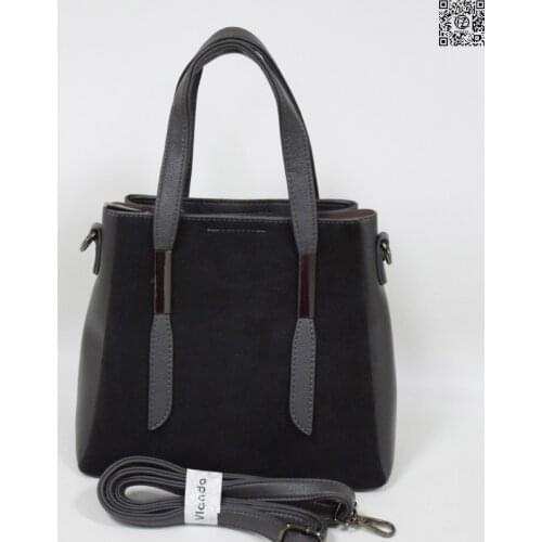 Womens bag, posess store, T100, front side natural suede, three departments, one main with a zipper, two on a magnet