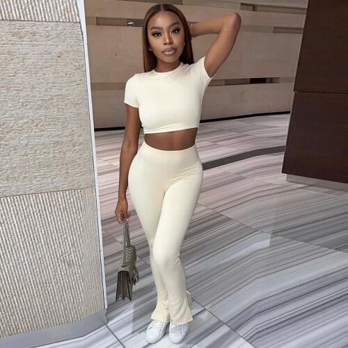 Activewear White Two Piece Sport Suit Womens Clothing 2021 Short Sleeve Bandage Crop Top and Split Hem Bell Bottom Pant Outfit