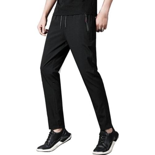 Male Pencil Pants Elastic Quick Dry Male Men Solid Color Thin Pants Fashion Korean Summer Streetwear 4XL pantalones hombre