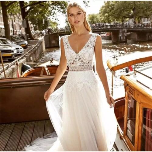Beach Wedding Dresses A-line Deep V-neck Tulle Lace Boho Backless Dubai Arabic Wedding Gown Bridal Dress Vestido De Noiva