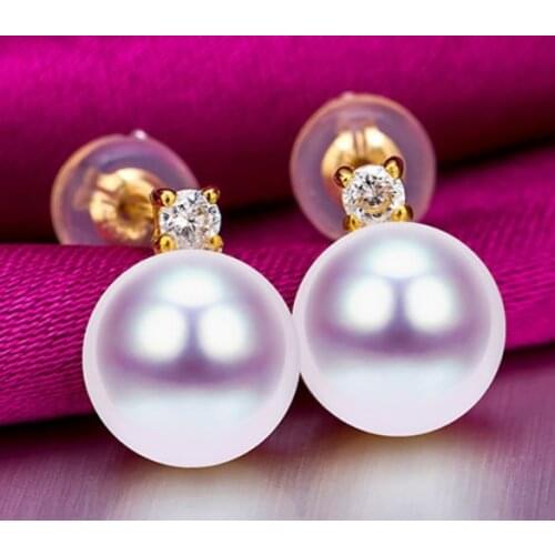 A pair of natural 910mm south sea White pearl earrings 18
