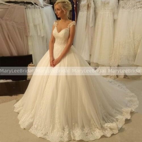 Princess Ball Gown Wedding Dress With Cap Sleeves Sheer Scoop Neckline Luxury Long Train Transparent Buttons Back Bridal Dress