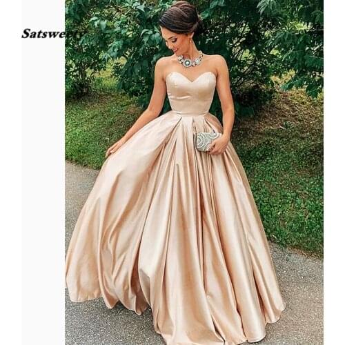 Puffy A Line Prom Dresses Lovely Sweetheart Backless Champagne Satin Party Wear Custom Made Floor Lenth Ruffle Princess Gown