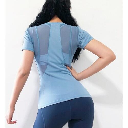 The new gym 2019 net yarn splicing short-sleeved female elastic running quick-drying t-shirts show thin yoga tops