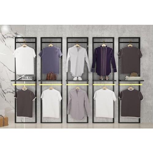 Clothing store background board display rack mens specialty store grid board shelf floor-standing hanger against the wall