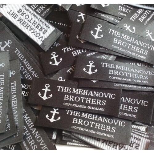 1000pcs , 2 * 6 cm Custom cursive script End fold black satin ribbon cloth woven label