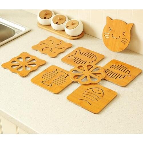 100pcs/lot Hollow wooden coasters Kitchen and thicken the hot heat eat mat antiskid pot pad bowl plate SN3418