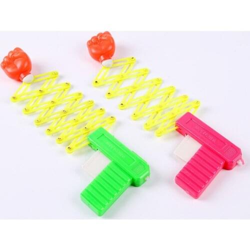 Practical Jokes Toys For Children Prank Elastic Spring Fist Weapon Funny Children Toys Plastic Gun Kids Gift