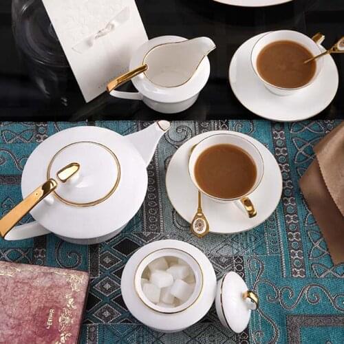 Nordic Luxury Cup Saucer Gold Bone China Tea Spoon Set European Style Afternoon Tea Coffee Cup Gold Inlay Tazas Drinkware DE50
