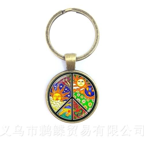 Peace Symbol Sun God Time Gem Keychains European And American Fashion Accessories Hope For World Peace Keyring