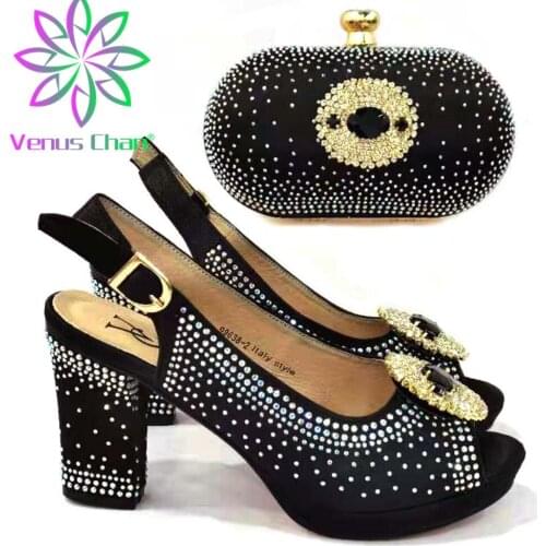 The Black Color Italian Design Nigerian Newest Party Platform Ladies Shoes and Bag Set Decorated With Phoenix Shape Metal