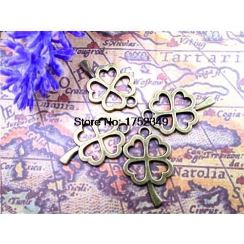125pcs-- Four Leaf charms,Antique Bronze Filigree Four-Leaf Clover Lucky Flower Charms pendants,jewelry supplies