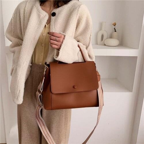 The new lady cross - slung one - shoulder bag solid color fashion simple handbag large capacity travel tote bag
