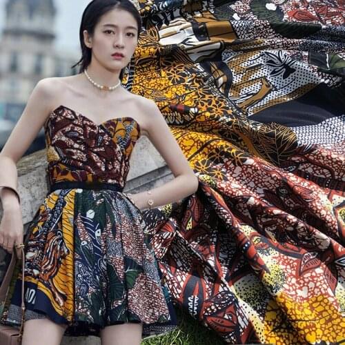 Stiff fashion printed polyester fabric cloth 145 cm width custom brand spring and autumn womens clothing fabric for dress