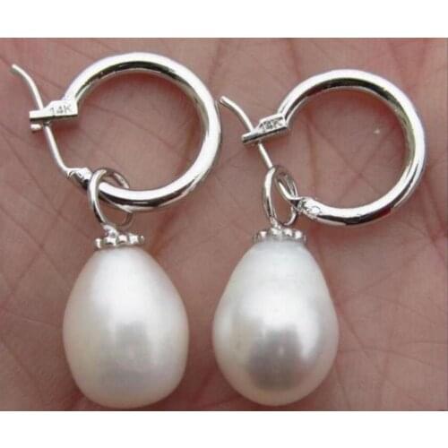 Charming pair of 11-12mm south sea baroque white pearl earring 14k