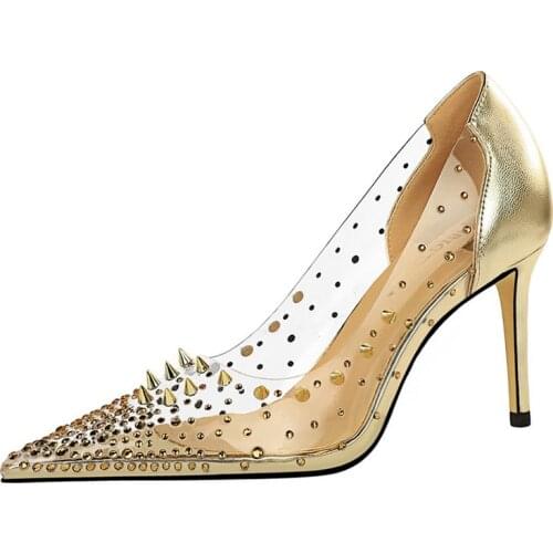Wind sexy metal rivet thin heel high heel shallow tip transparent rhinestone spliced hollow single shoe