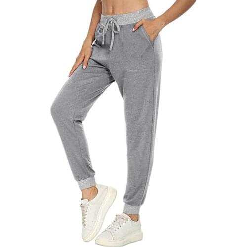 Womens Explosive Spring and Autumn Sports Pants Solid Color Drawstring Pocket Sports Pants Fitness Running Leisure Loose Plant