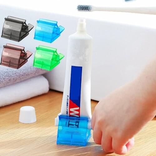 Toothpaste Tube Squeezer Dispenser Rolling Tooth Cleaning Clip Bathroom Accessory Plastic Manual Toothpaste Rolling Holder Tool