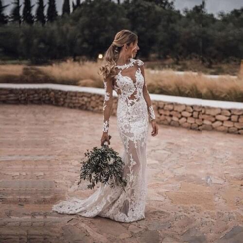 Latest Arrival White Lace Long Sleeve Bridal Wedding Gowns Open Back Appliqued Illusion Bottom Wedding Dresses for Bride On Sale