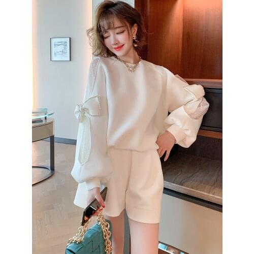 Stitched mesh sleeve with diamond bow, loose comfortable body covering sweater for women 2021 Spring new High Top Quality