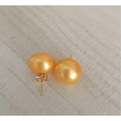 Charming a pair of 10-11mm natural south sea gold pearl earring