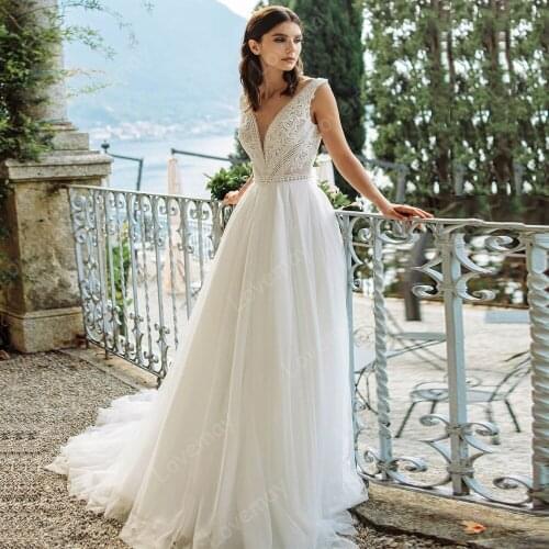 2021 Beach Wedding Dress Sleeveless V Neck Lace Applique Open Back Tulle A Line Boho Wedding Bridal Gowns Vestido De Novia