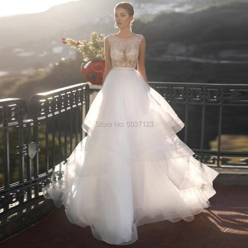 A Line Tulle Wedding Dresses Beaded Sheer Top Sleeveless Illusion Ruffles Bridal Wedding Gown Vestido De Noiva Robe De Mariée