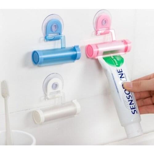 Plastic Rolling Tube Squeezer Toothpaste Dispenser Sucker Holder Dental Cream Bathroom Manual Syringe Gun Toothpaste Dispenser