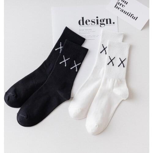 Mens and womens sports high tube autumn and winter couples ins tide brand pure color socks XX hip hop tide casual socks